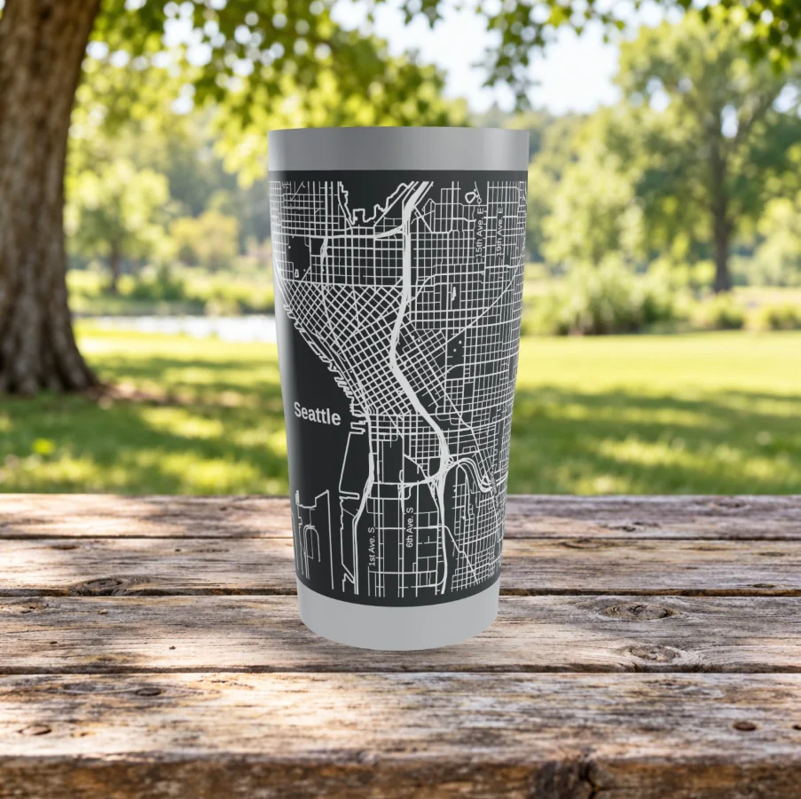 Black tumbler engraved with a detailed hometown street map