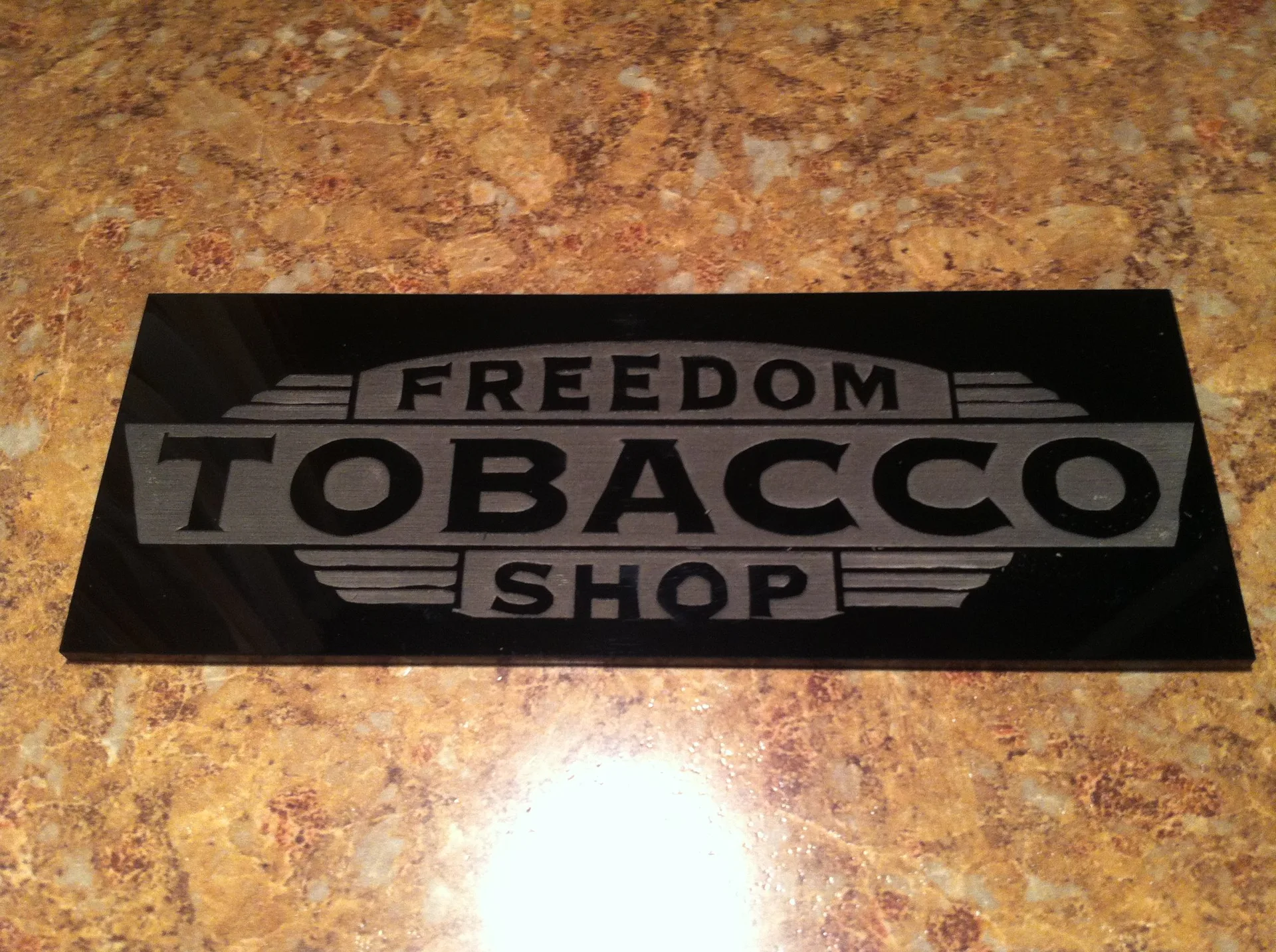 Engraved business branding piece